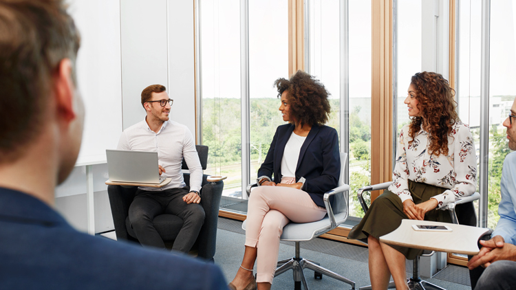 A group of training participants sitting in a seminar room