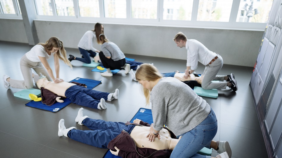Several people in first aid training.